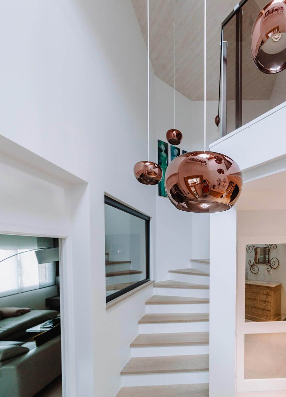 Aménagement d'une entrée de maison suspensions luminaires